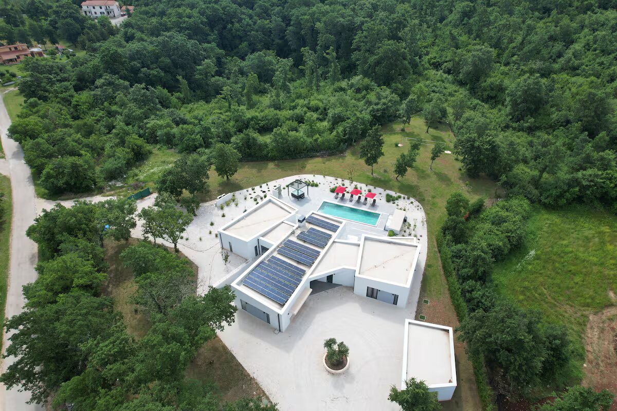 Aerial view of the estate with solar panels